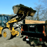 Buckeye Outdoor Supply - Loading mulch into truck for delivery